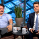 Washington Post reporter David Weigel (left) interviews Florida Congressman Matt Gaetz (right) while the two play Madden 18.